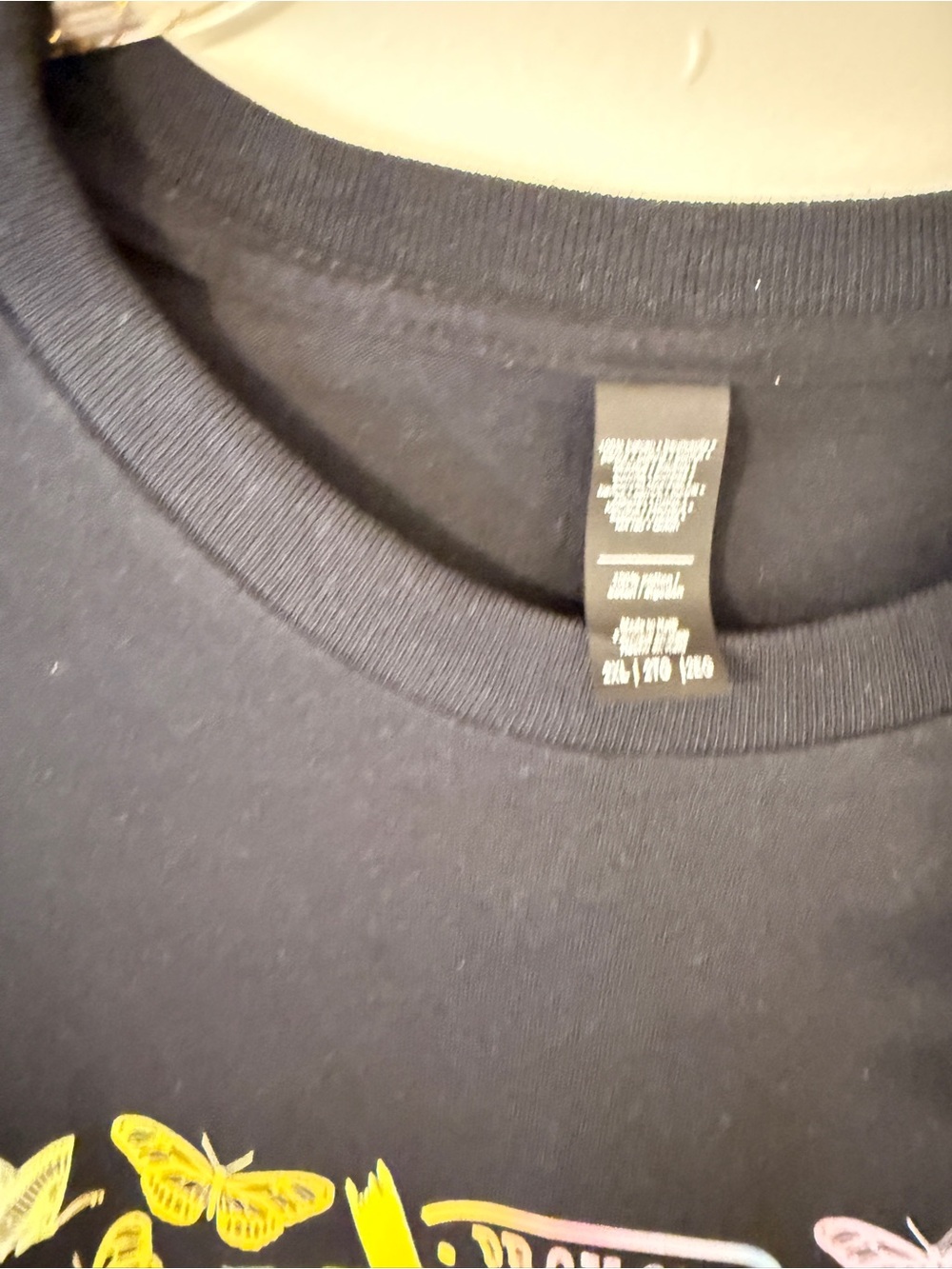 H&M Black Short Sleeve Tee with Pastel Butterfly Cross Graphic - Picture 3 of 4